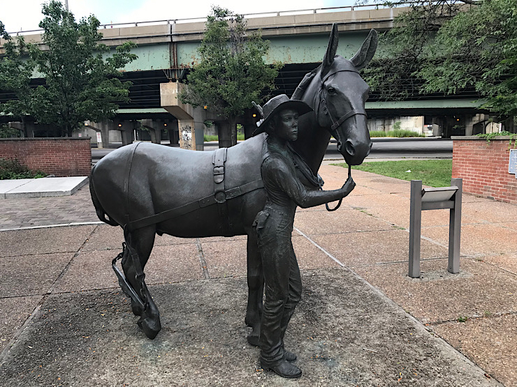 mule and boy statues