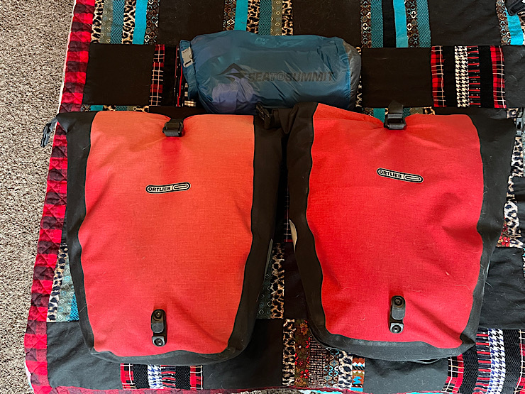 Packed in panniers and one dry sack